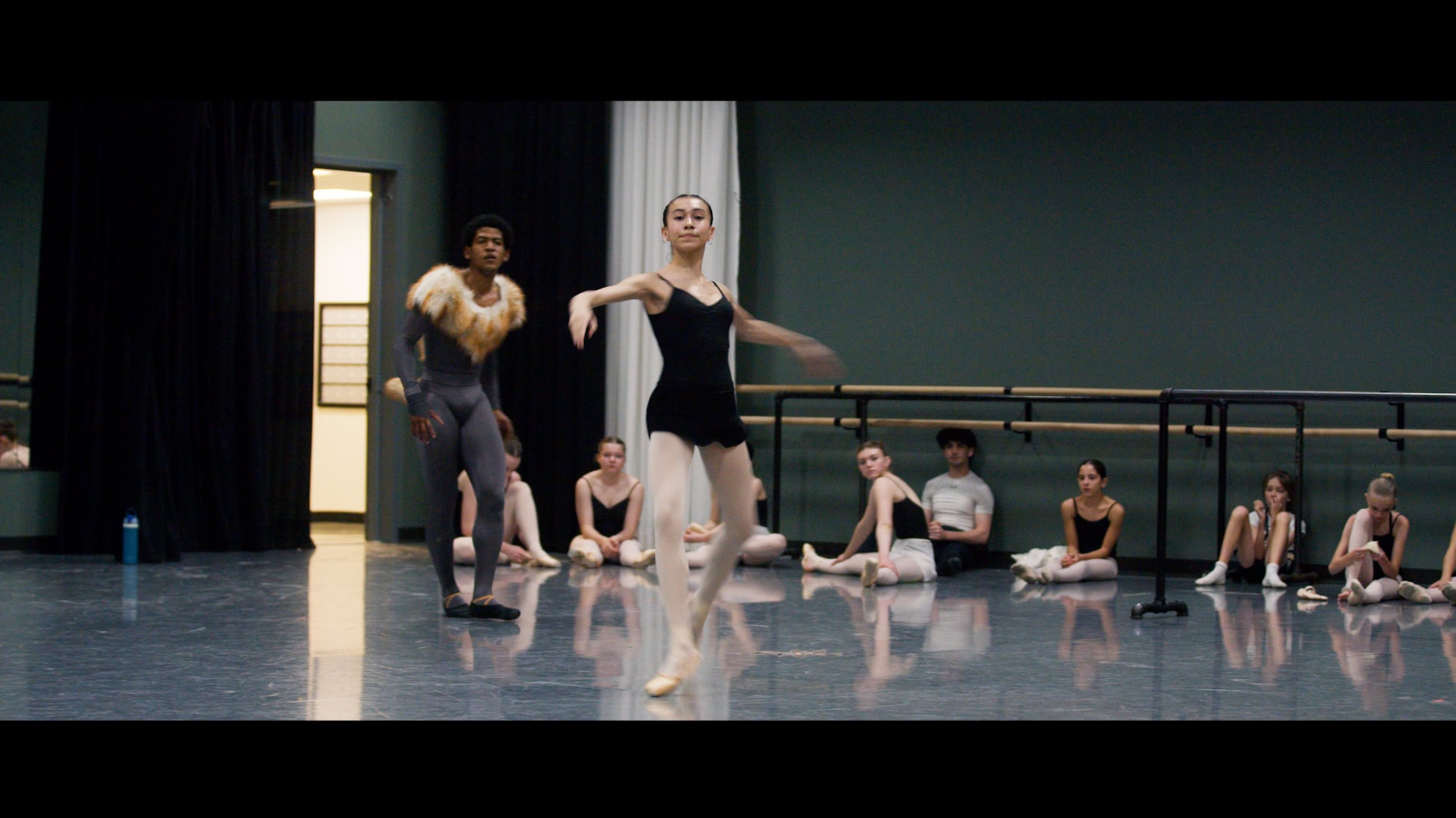 Ballet dancers rehearsing.